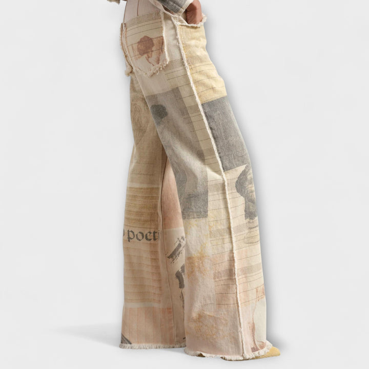 RHEA™|JEANS A GAMBA LARGA STAMPATE CON UN TOCCO VINTAGE