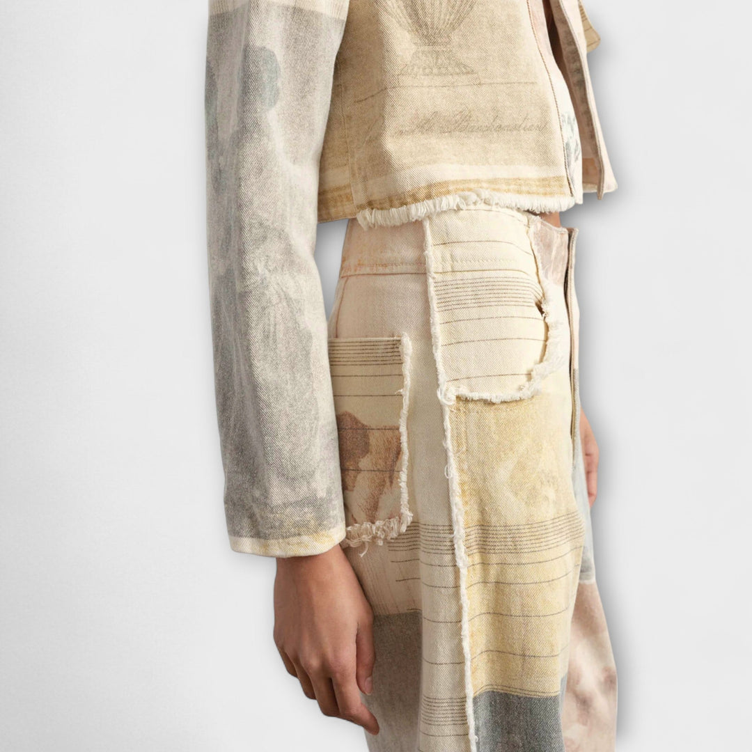 RHEA™|JEANS A GAMBA LARGA STAMPATE CON UN TOCCO VINTAGE