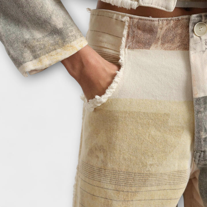 RHEA™|JEANS A GAMBA LARGA STAMPATE CON UN TOCCO VINTAGE