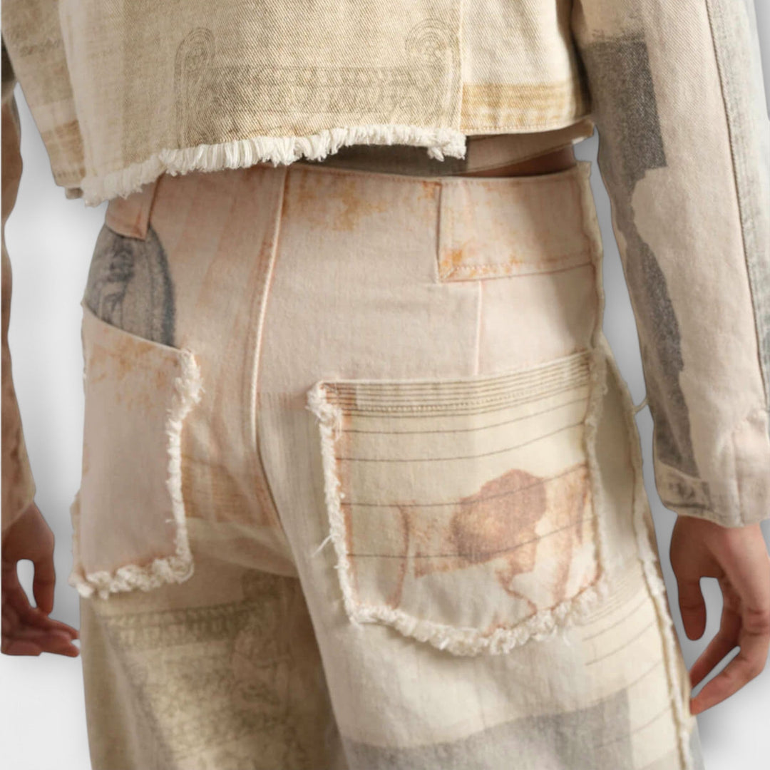 RHEA™|JEANS A GAMBA LARGA STAMPATE CON UN TOCCO VINTAGE