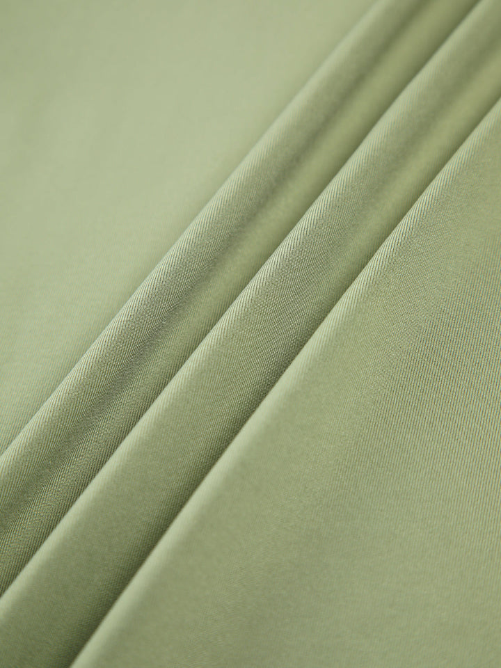 NORA™|TOP A MANICHE LUNGHE ESSENZIALE ELASTICIZZATO