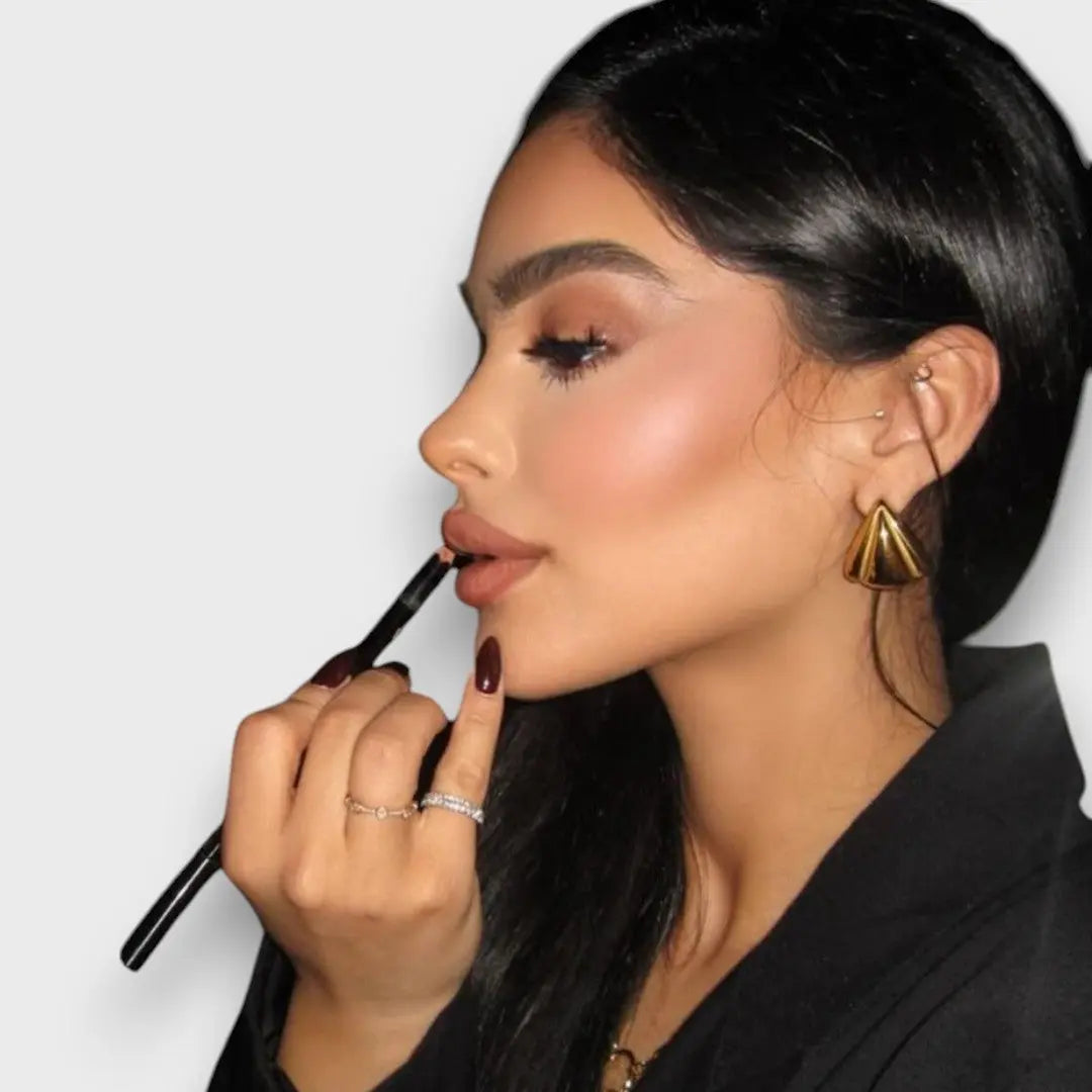 NUNA™|ORECCHINI DORATI CON CARATTERE SCULTOREO